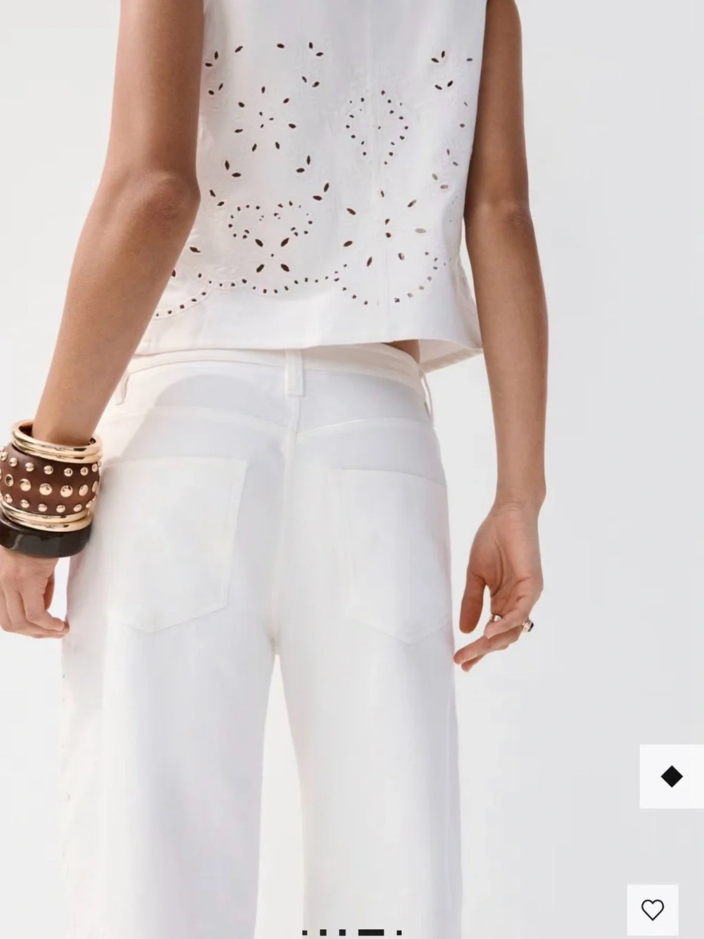 Balloon jeans with openwork embroidery